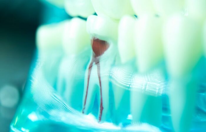 Smiling dental patient looking over her shoulder
