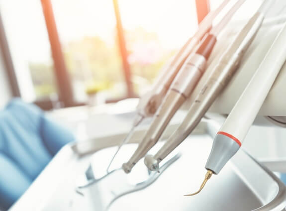 Row of dental instruments in treatment room