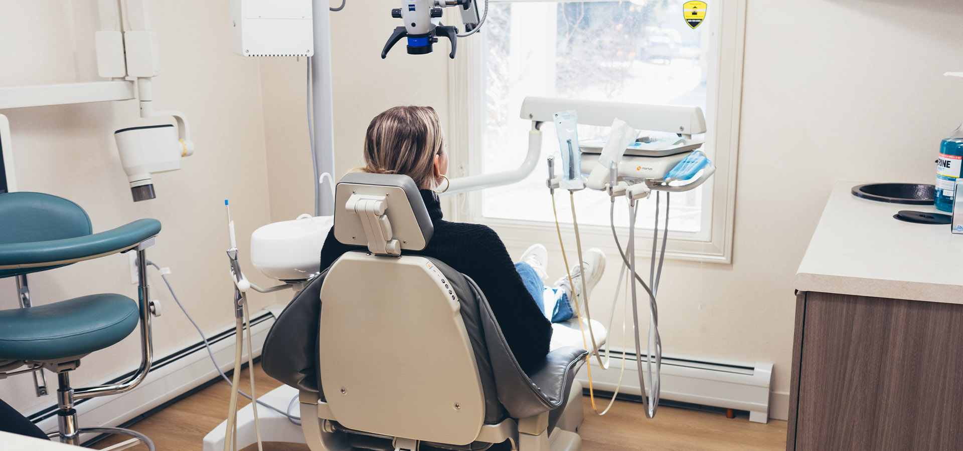 Patient waiting patiently in a dentist chair at Liv Endodontics